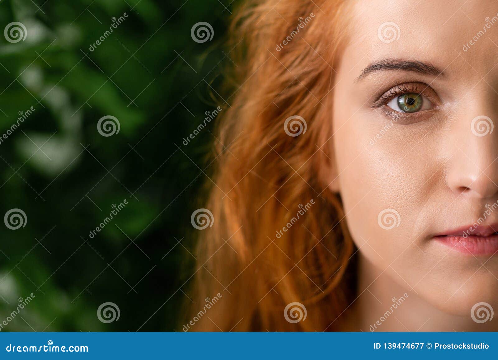 Redhead Girl With Green Eyes