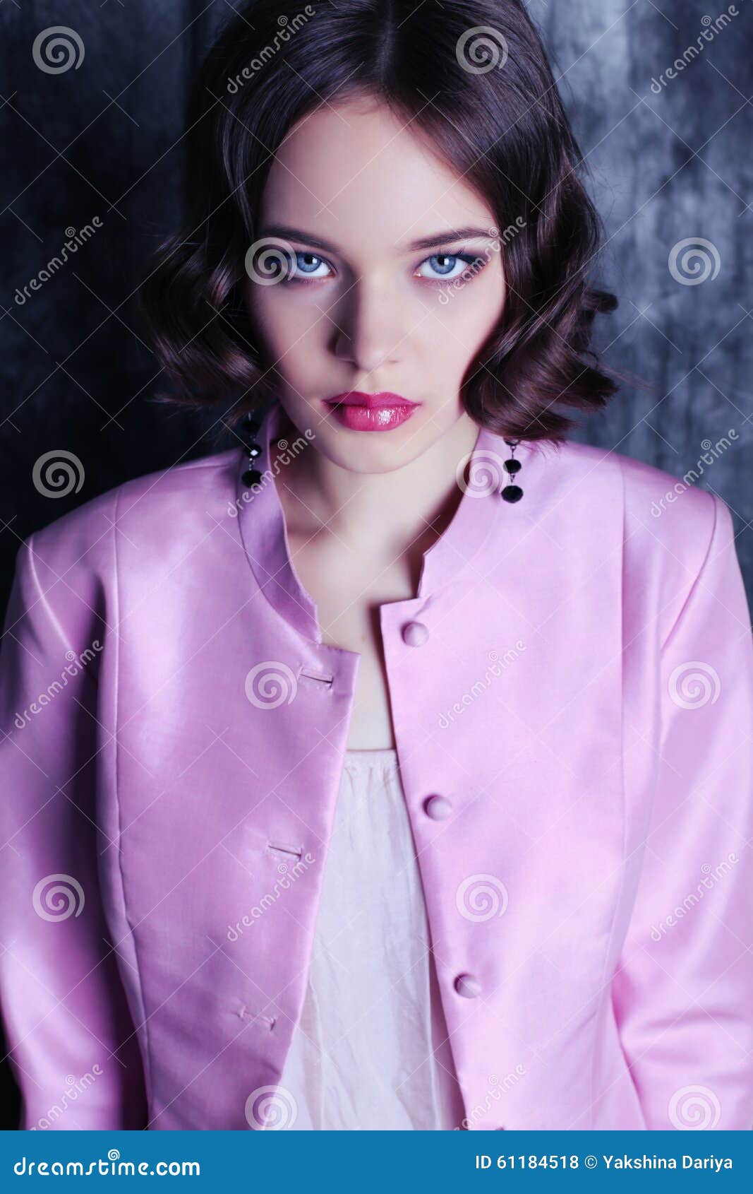 Beautiful Young Girl With Dark Short Hair And Blue Eyes