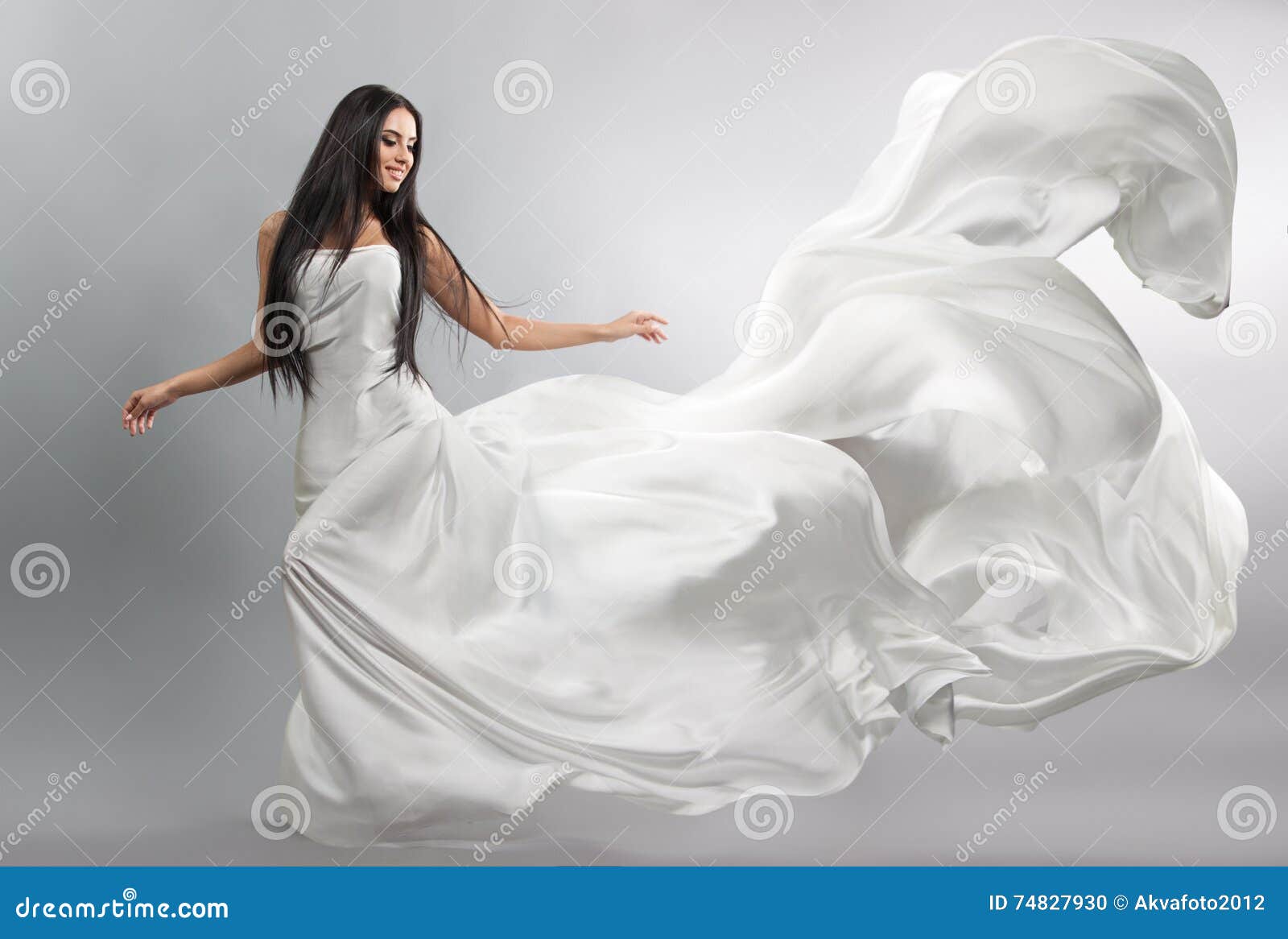 Beautiful Young Girl in Flying White ...