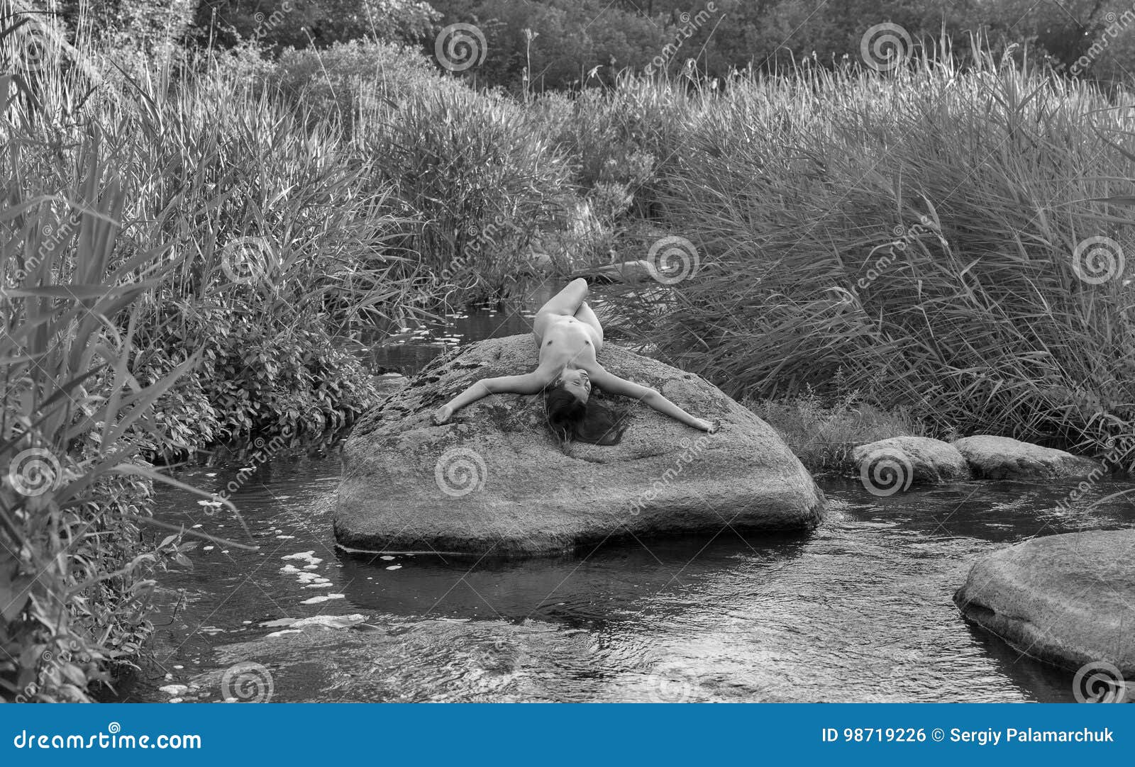 girls naked by a stream