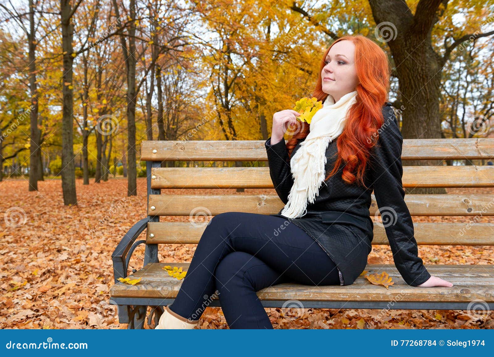 Beautiful Young Girl Portrait Sit on Bench in Park with Yellow Leaf in ...