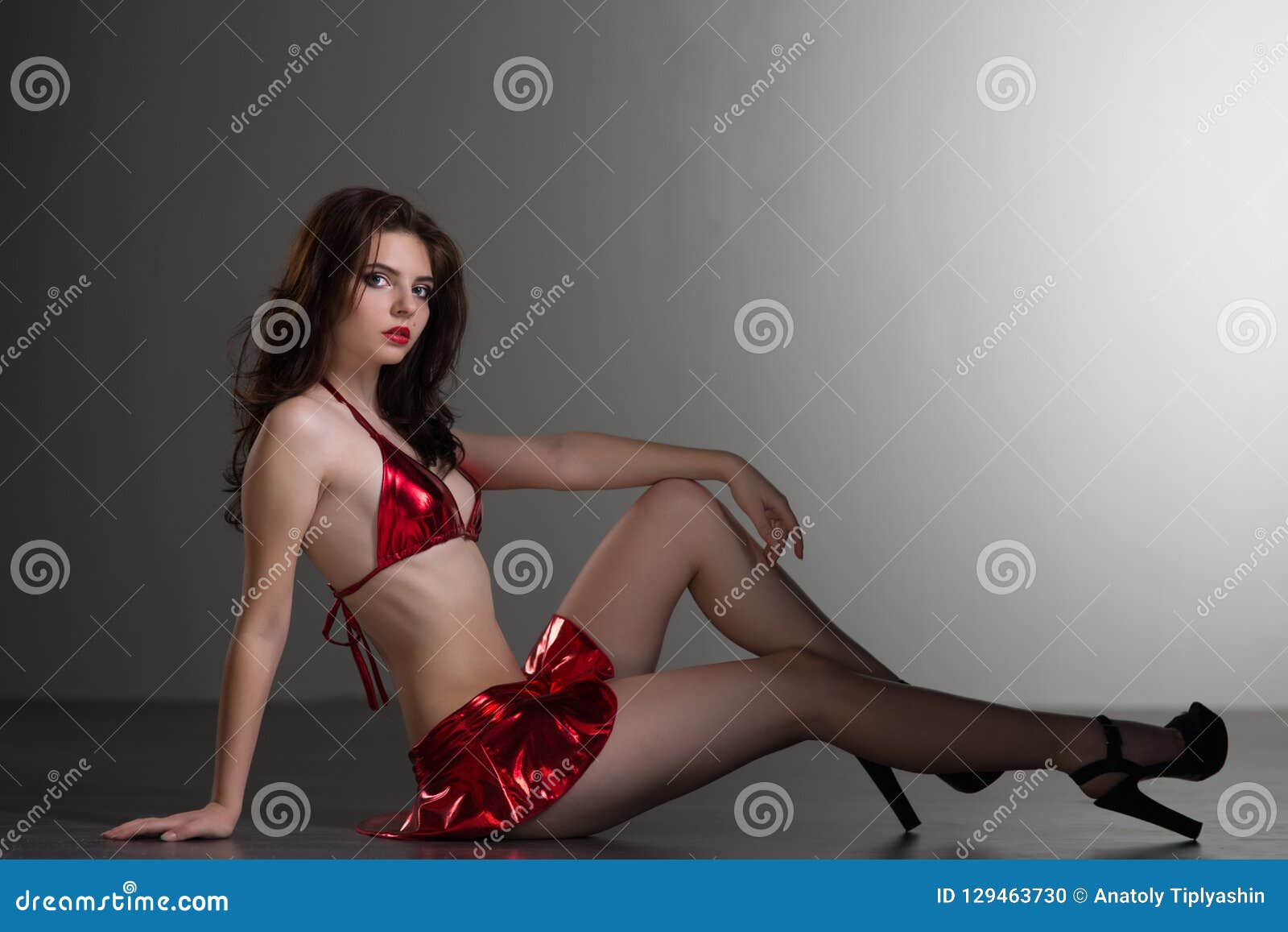 Young girl in red underwear Stock Photo by ©Ruslan 148228343