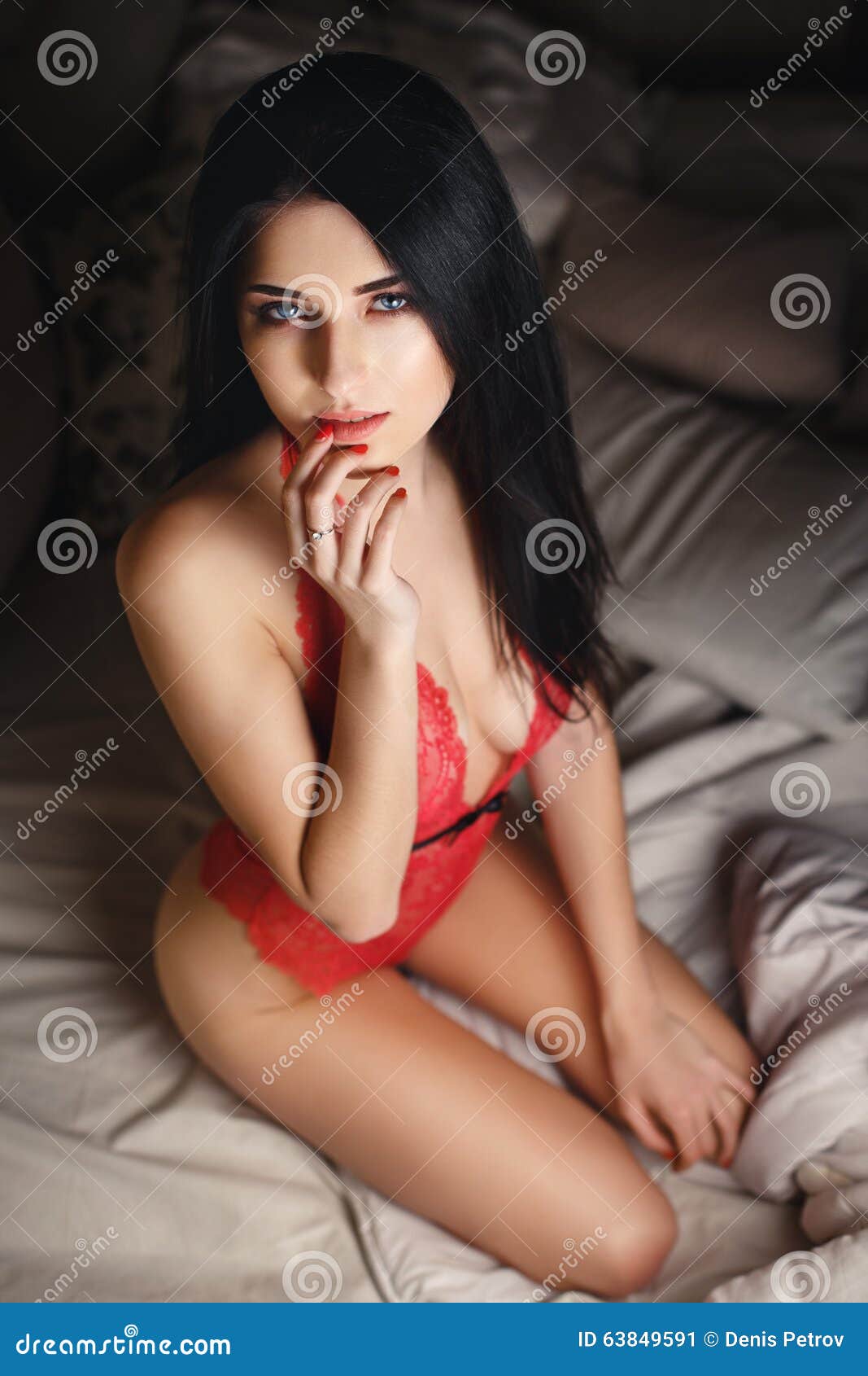 Beautiful Young Girl in a Red Lingerie Stock Image