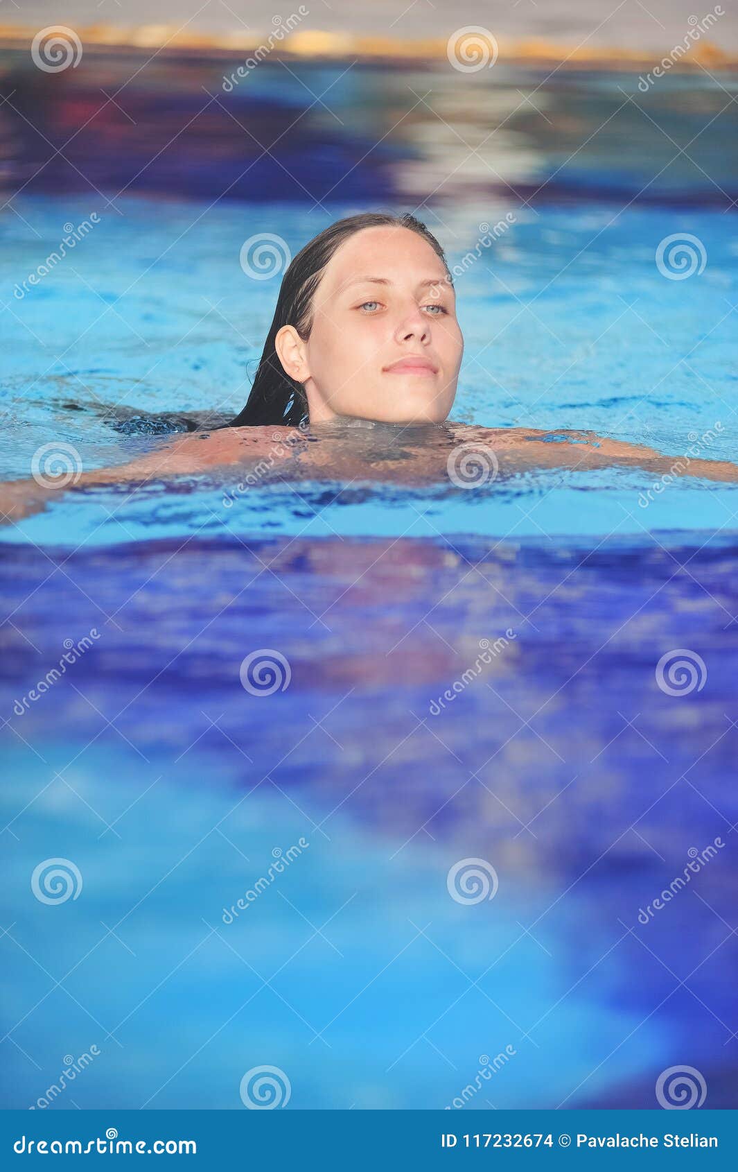 Beautiful Young Girl Swim in a Blue Pool Stock Photo - Image of cocktail, swimming: 117232674