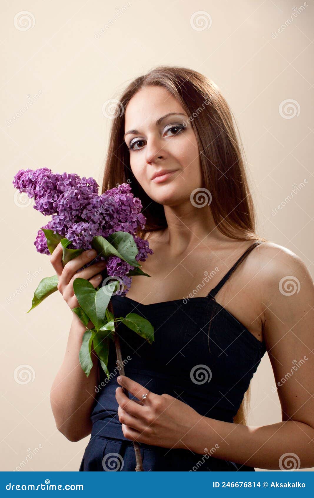 Beautiful Young Girl Weared in Black Dress with a Bouquet of Lilac ...