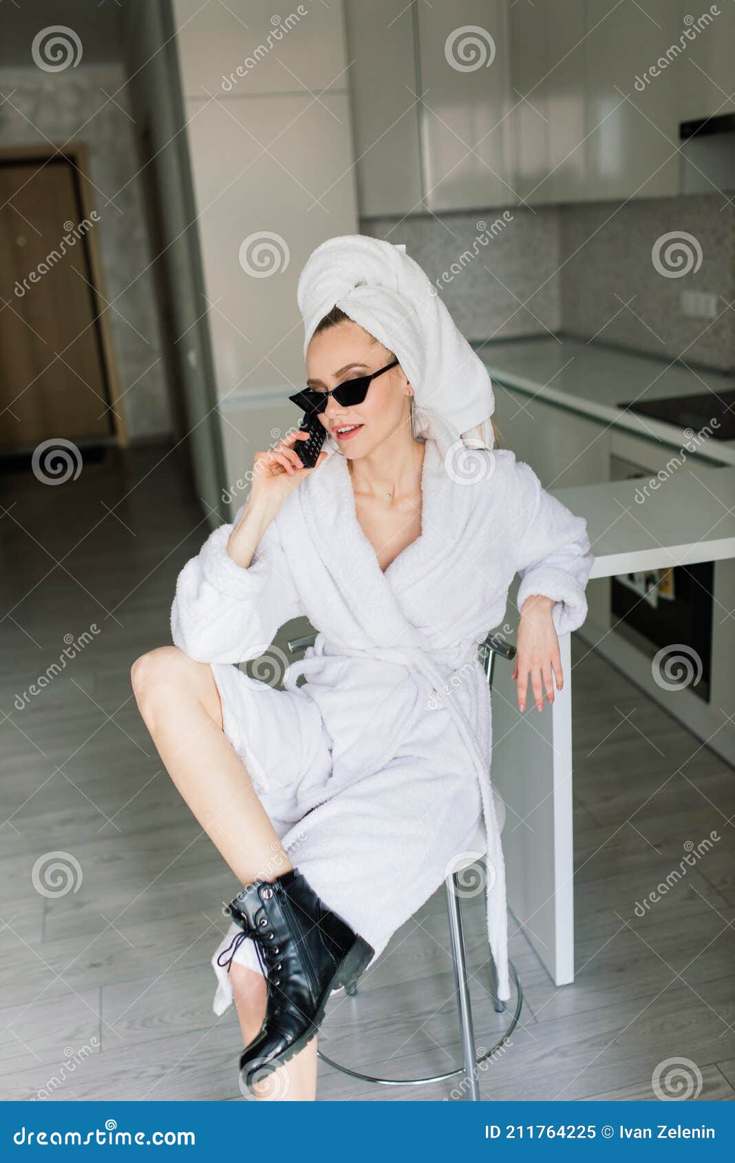 beautiful young healthy woman relaxing in a robe, hotes, room, spa salon