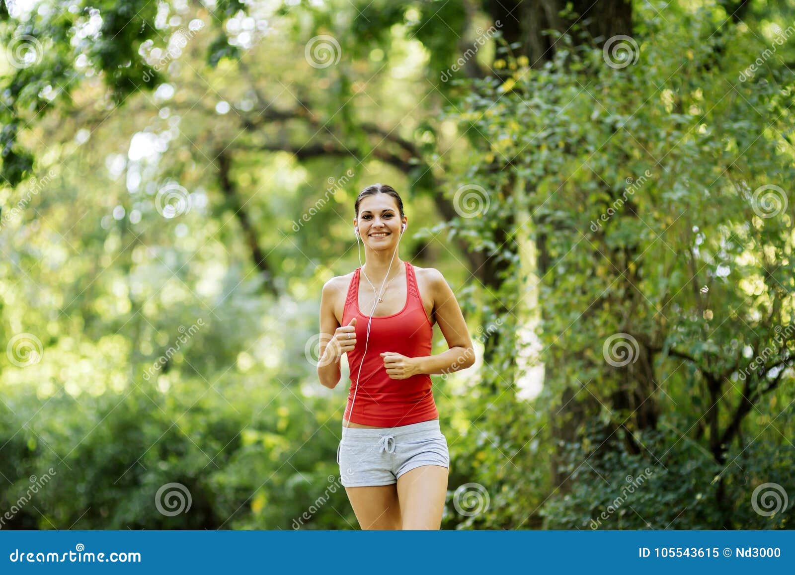 Beautiful Young Jogger in Park Stock Image - Image of green, motion ...