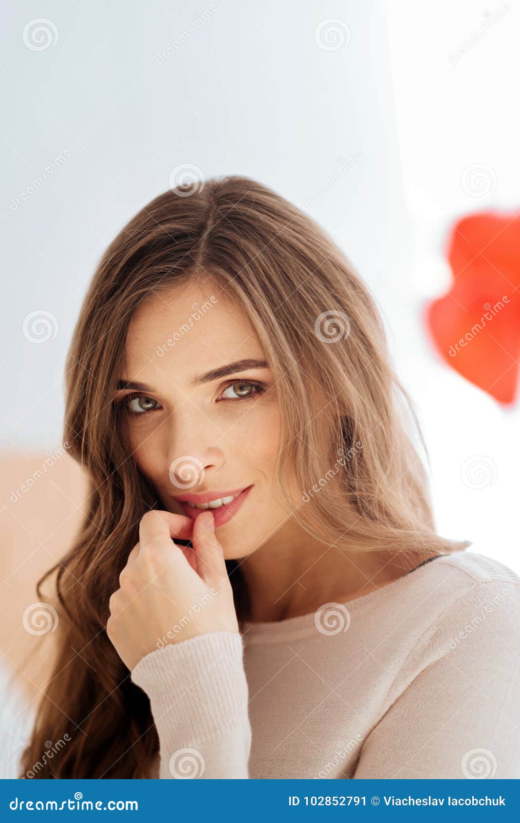 Beautiful Young Lady Tempting While Looking Into Camera Stock Image