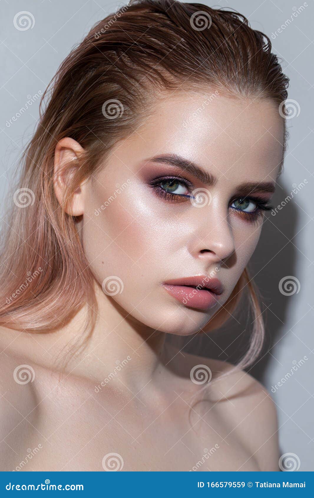 Beautiful Young Woman With Clean Perfect Skin. Portrait Of 