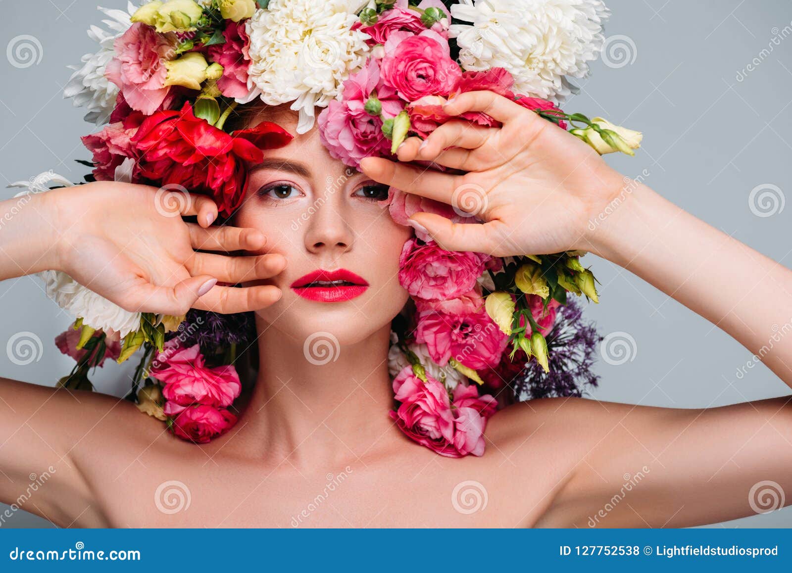 Beautiful Young Naked Woman In Floral Wreath Looking At Camera Stock