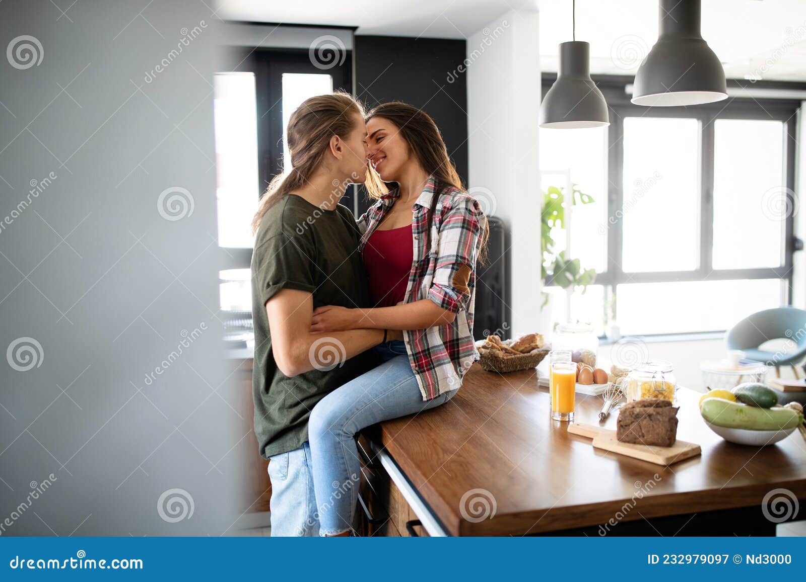 Beautiful Young Passionate Couple is Smiling and Hugging before Having Sex at Home Stock Image photo