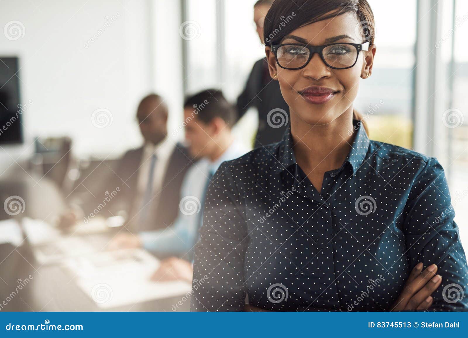 beautiful young professional woman in office