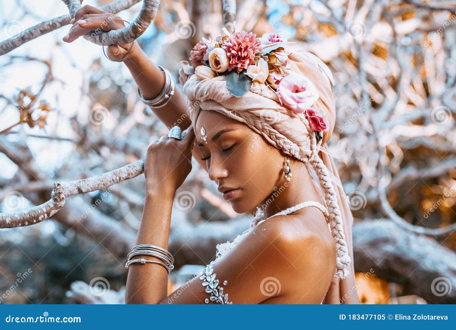 beautiful young stylish woman wearing flowers wreath outdoors portrait