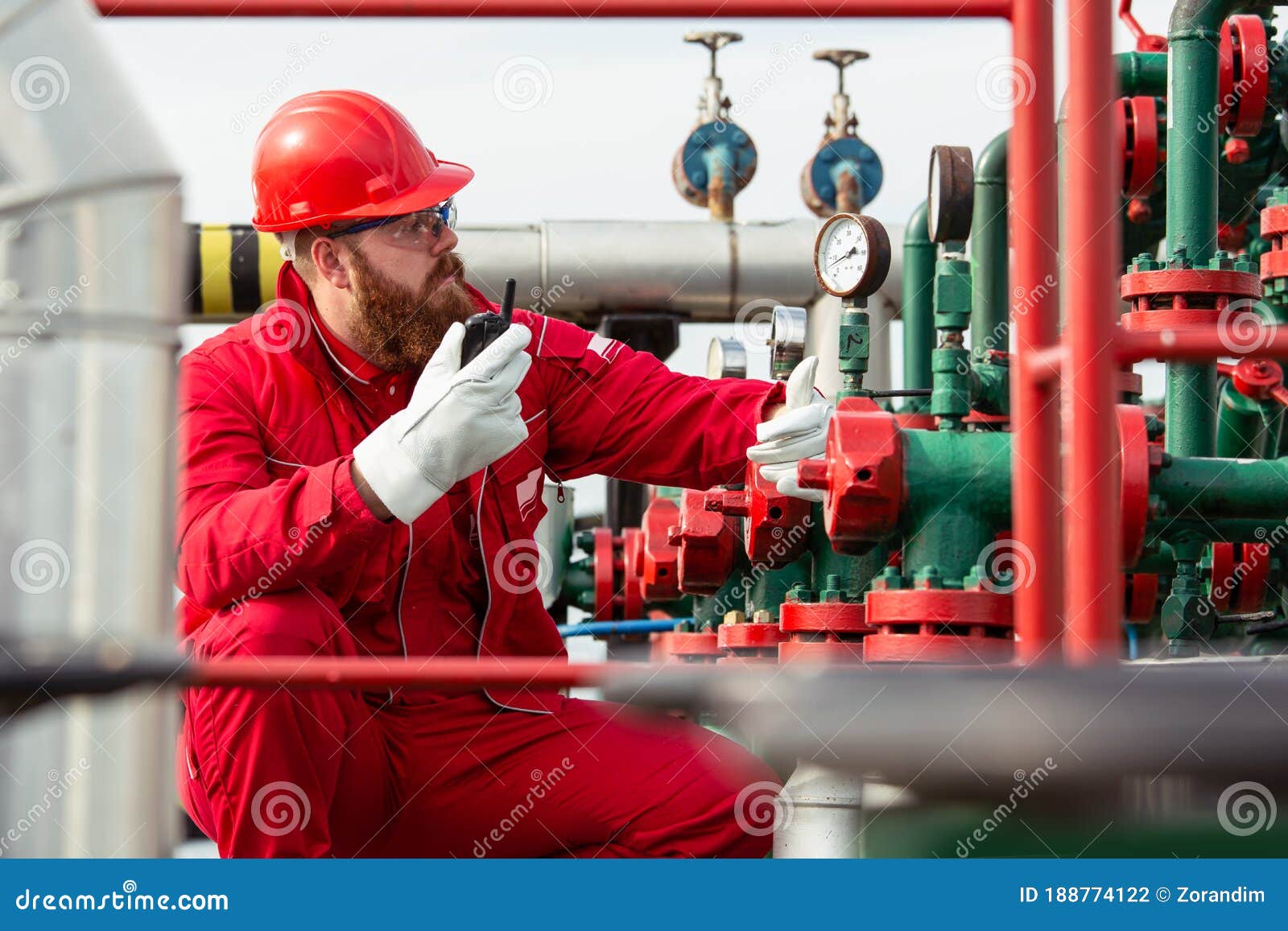 Technician in Oil and Gas Refinery. Worker in Oil Refinery Stock Photo