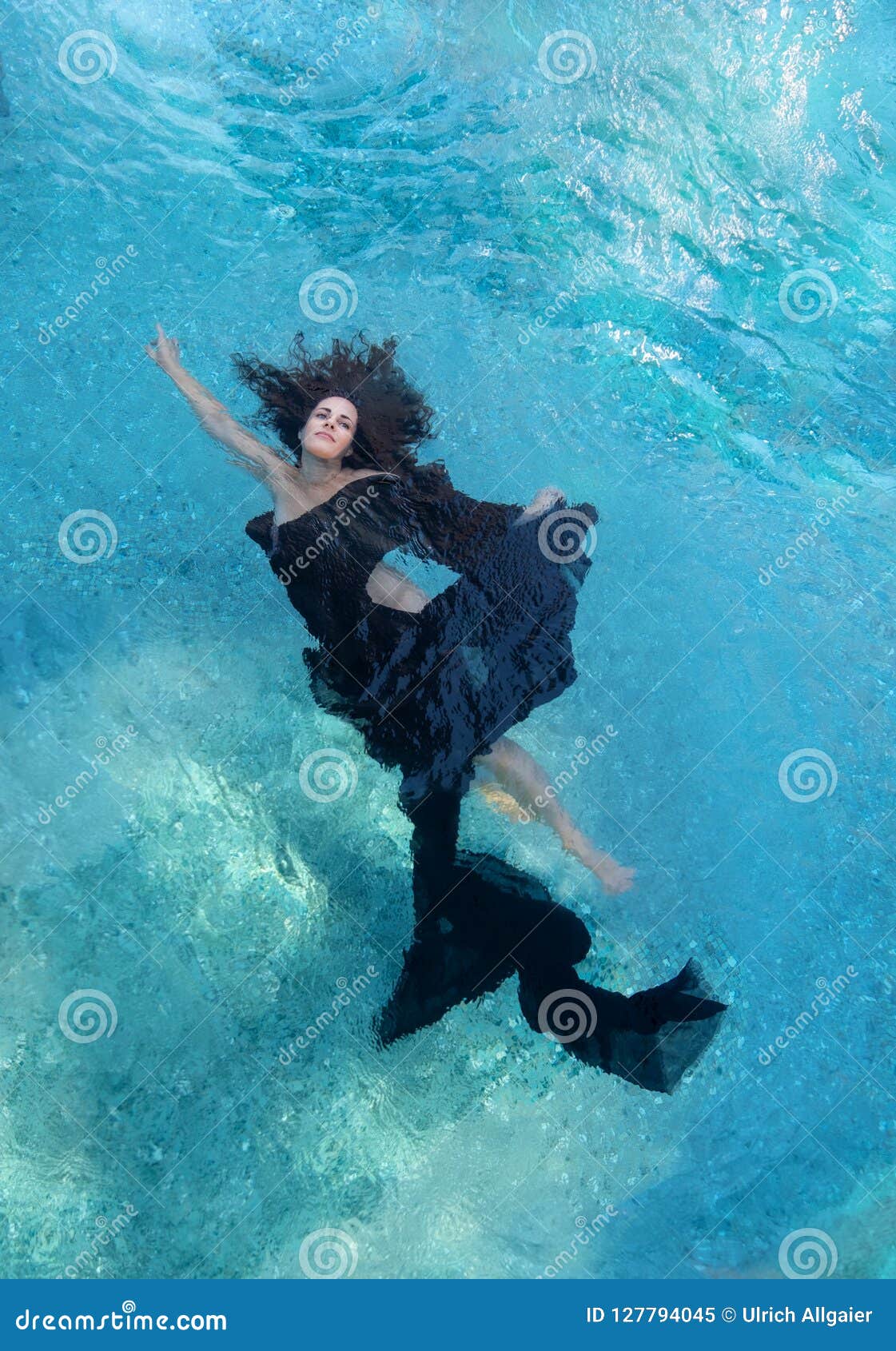 Beautiful Young Woman In Black Dress Dark Brown Curly Hair