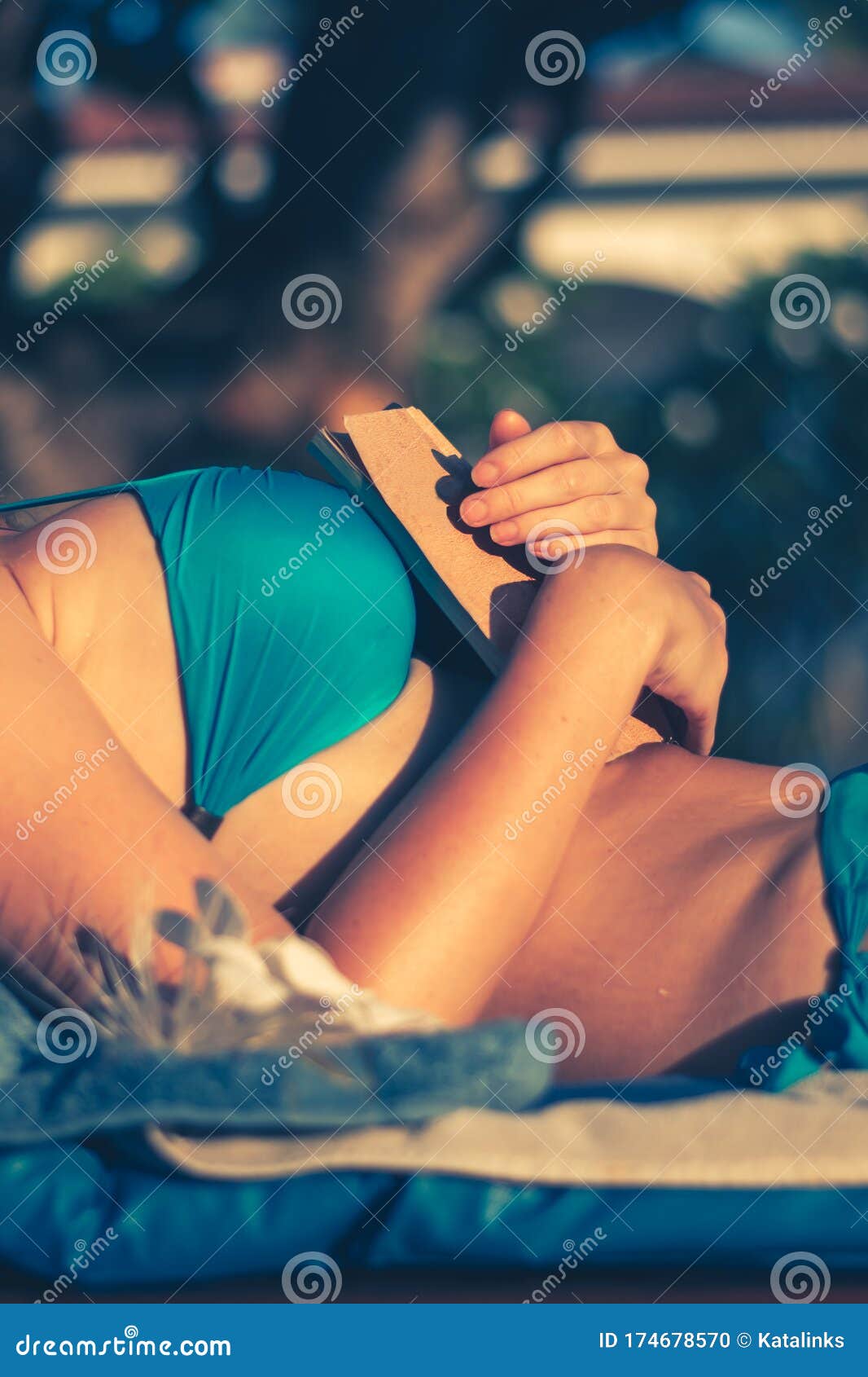 Beautiful Young Woman in Bikini Swimsuit Sleeping with Book in Hands on a  Wooden Deck Chair with Mattress Stock Photo - Image of attractive,  mattress: 174678570