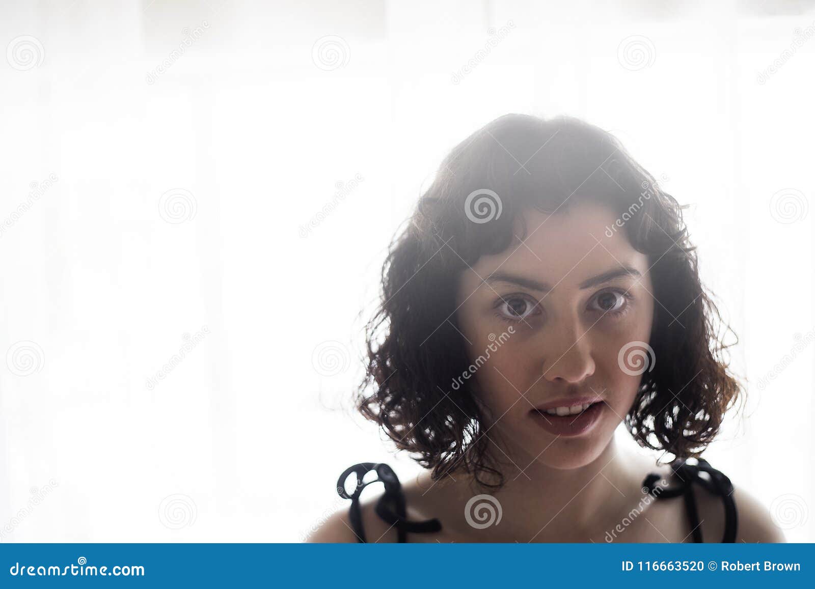 Beautiful Young Woman With Brown Hair And Eyes Stock Photo