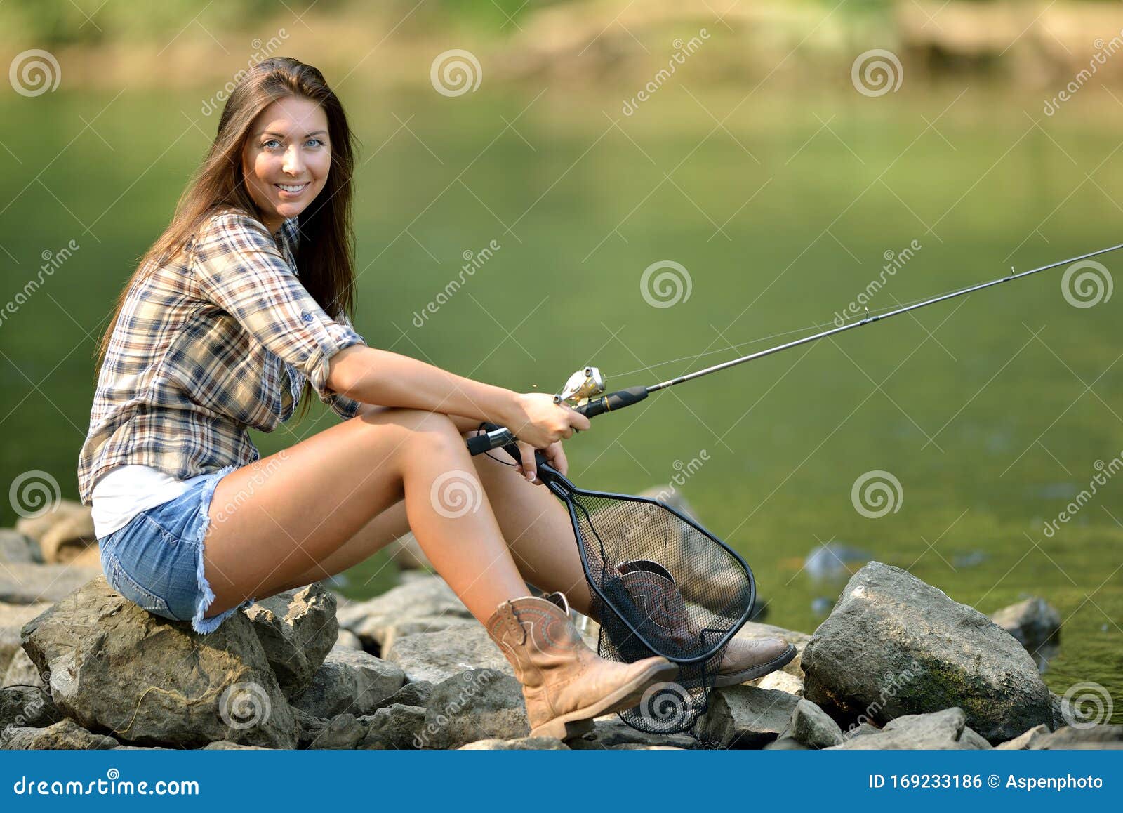Young Woman Sitting Near River Fishing Stock Photo - Image of