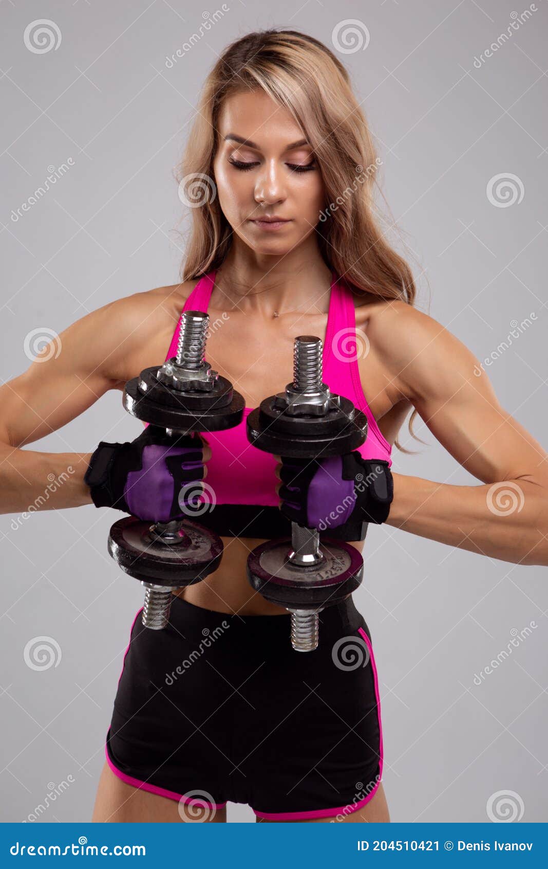 Beautiful Young Woman Doing Exercises With Dumbbells On The Biceps Photo Of A Sporty Woman With