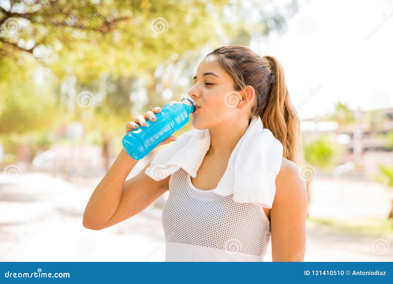 Woman Drinking Water after Running Workout Stock Photo - Image of ...