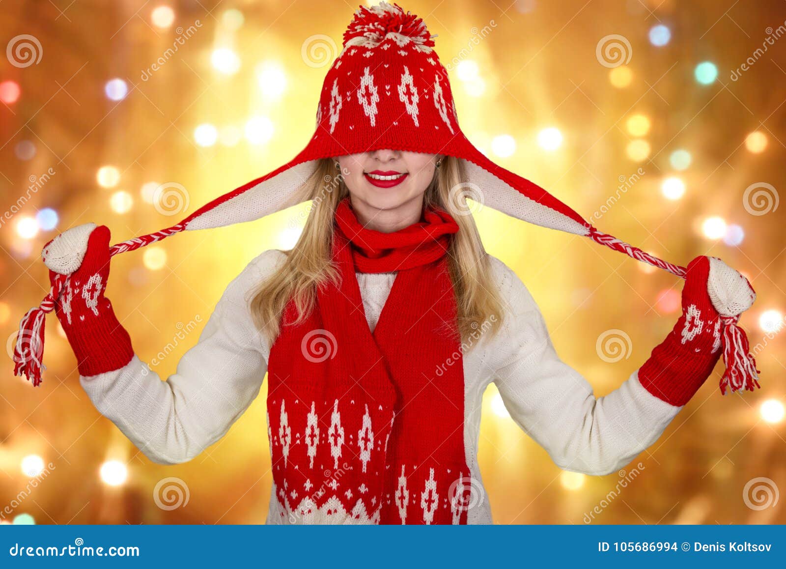 Beautiful Young Woman in a Beautiful Knitted Hat, Mitten and Scarf ...