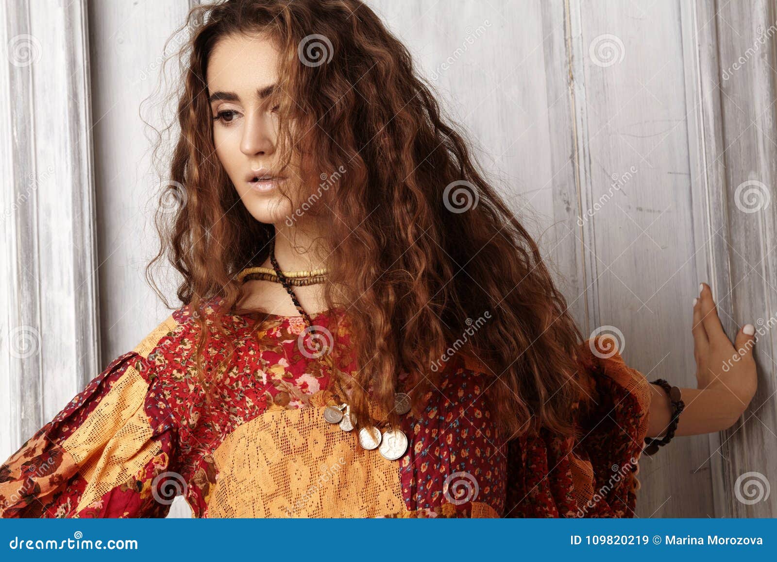 Beautiful Young Woman with Long Curly Hairstyle, Fashion Jewelry with  Brunette Hair. Indian Style Clothes, Long Dress Stock Image - Image of  look, jewelry: 109820219