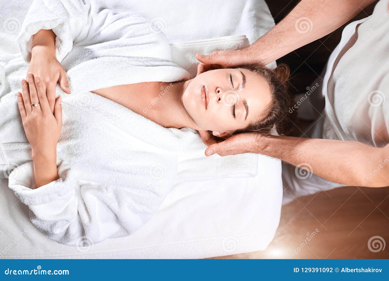 Beautiful Young Woman Receiving Massage On Head And Shoulders Zone In