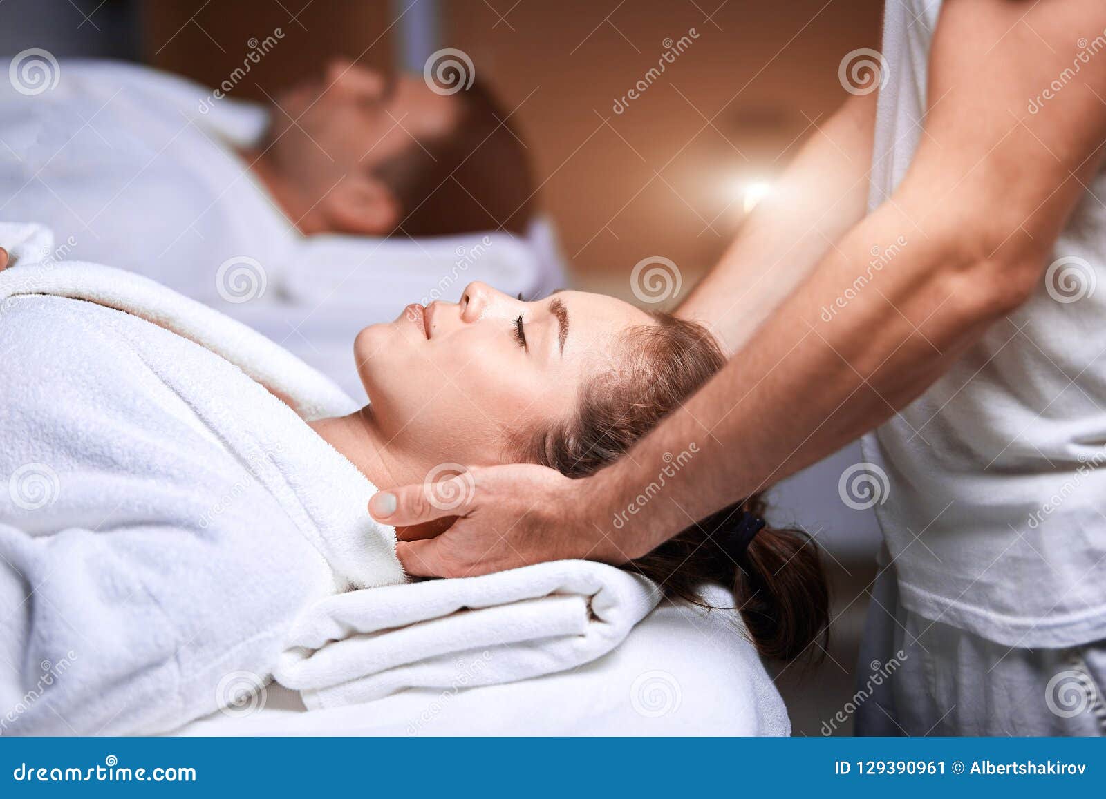 Beautiful Young Woman Receiving Massage On Head And Shoulders Zone In