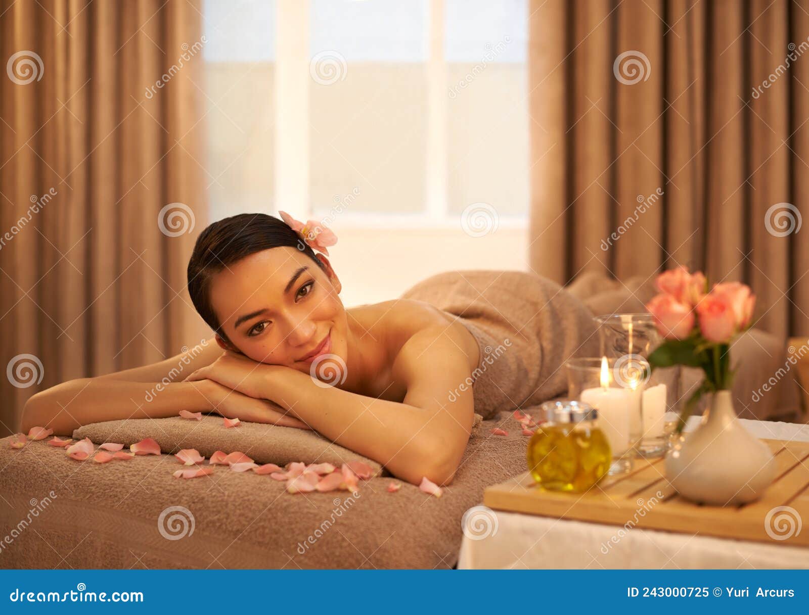 Rejuvenate And Revive A Beautiful Young Woman Relaxing On A Massage