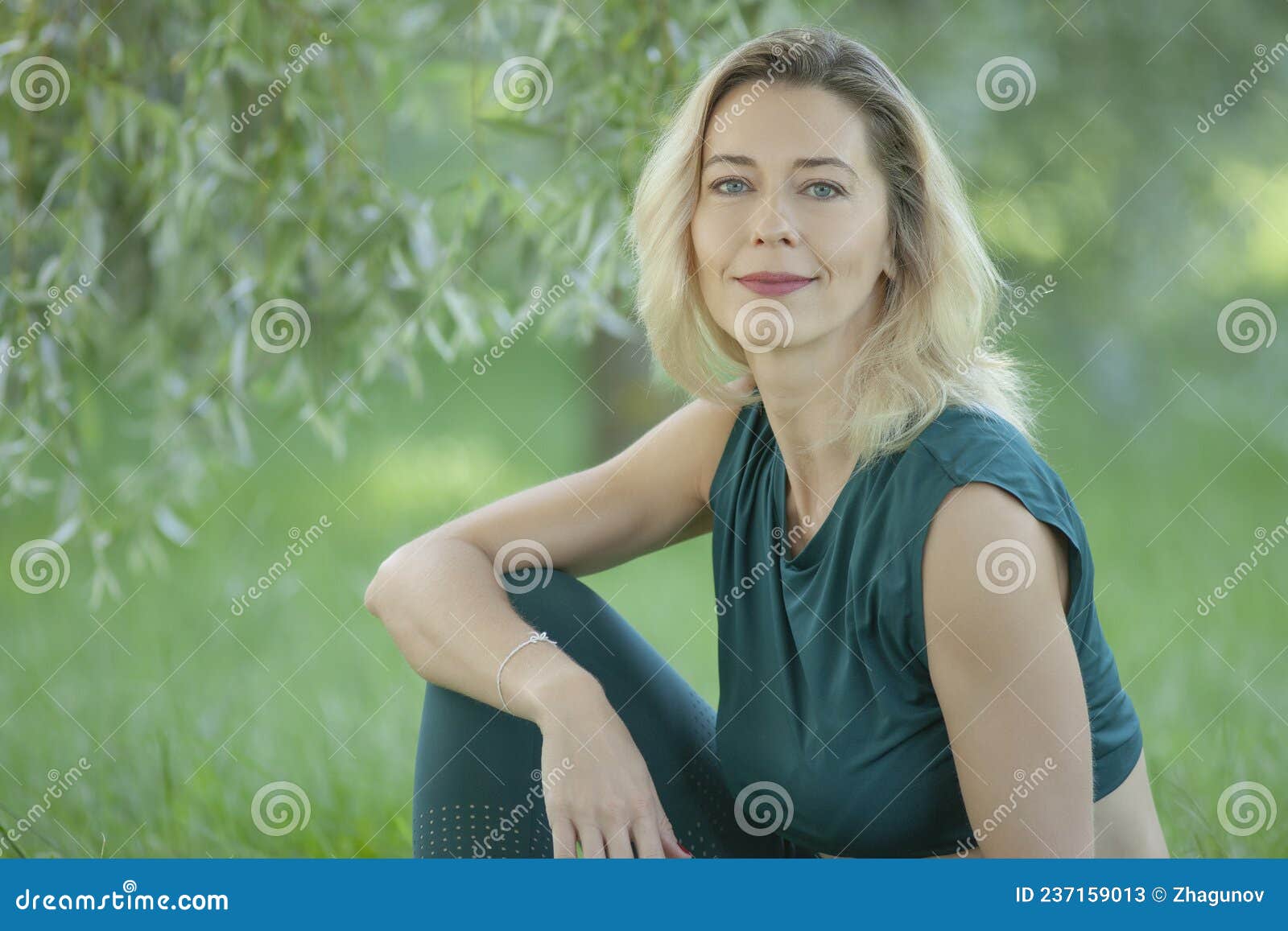 beautiful young woman relaxing outdoors