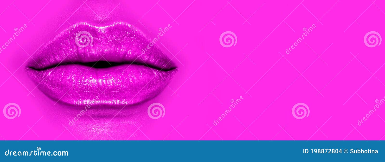 beautiful young woman`s lips closeup, on purple background. plastic surgery, fillers, injection. part of the model girl face