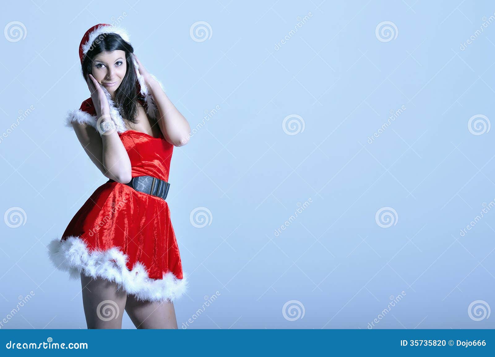 Beautiful young woman in Santa costume