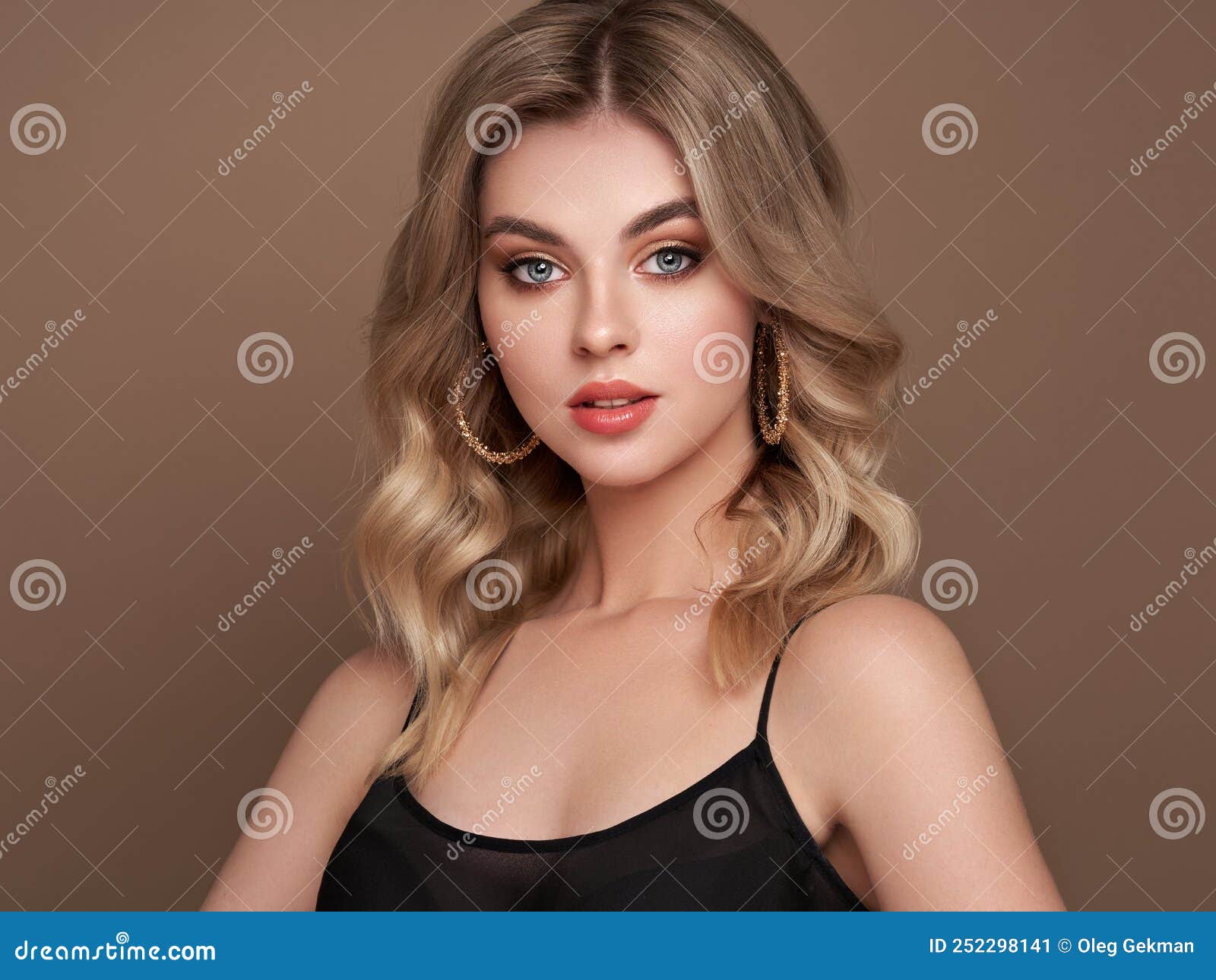 A Beautiful Young Woman With Shiny Wavy Blonde Hair Stock Image Image