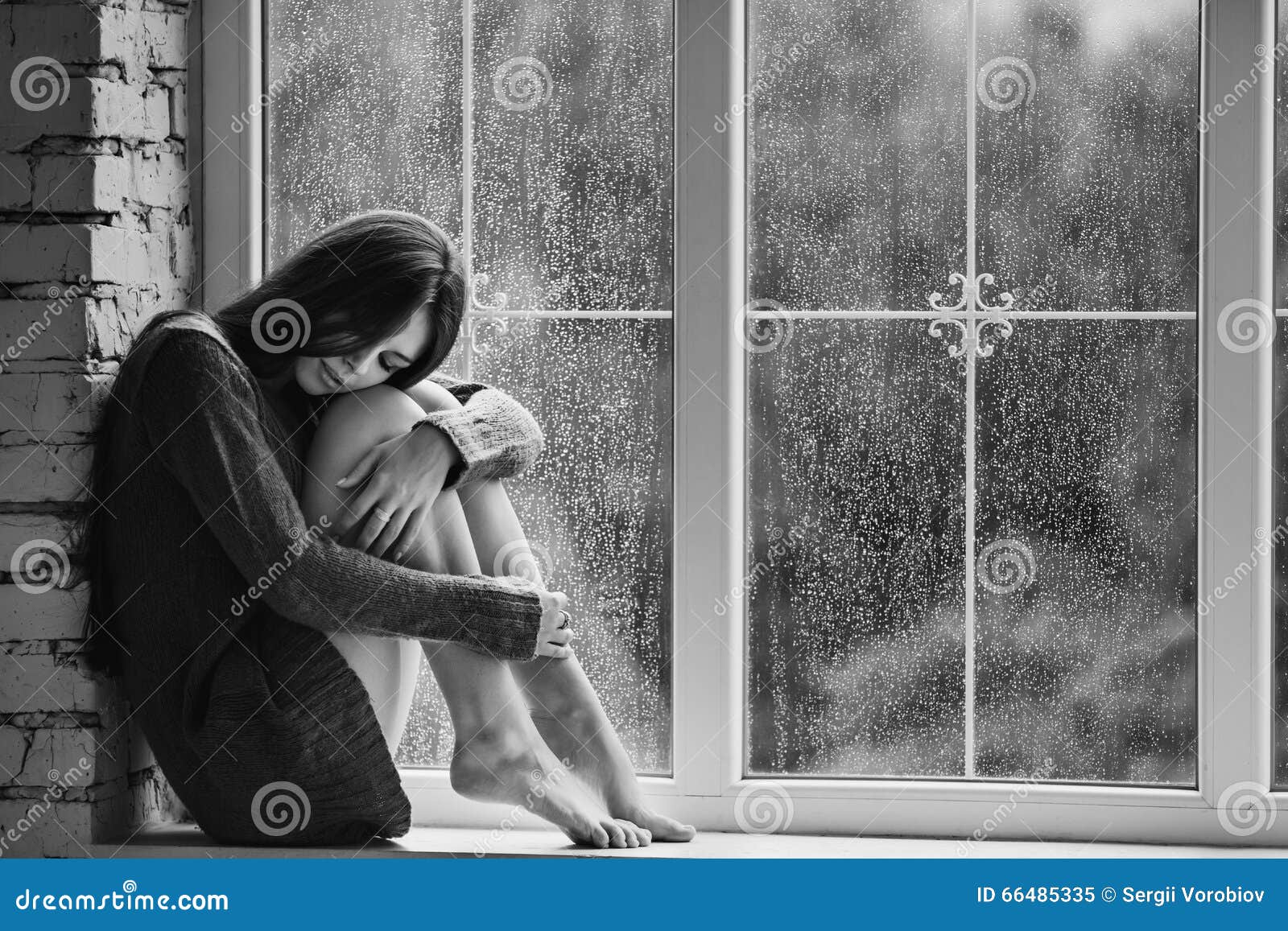 Beautiful Young Woman Sitting Alone Close To Window with Rain Drops. and  Sad Girl. Concept of Loneliness. Black Stock Image - Image of sadness, alone:  66485335