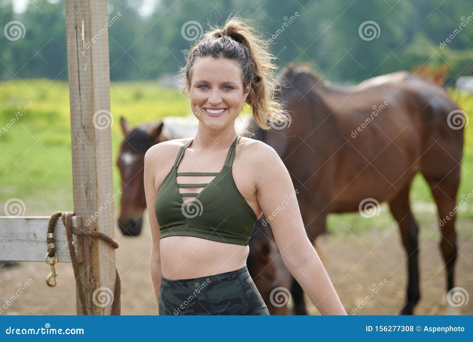 Beautiful Young Woman in Sports Bra and Leggings on Horse Farm Stock Photo  - Image of girl, equestrian: 156277308