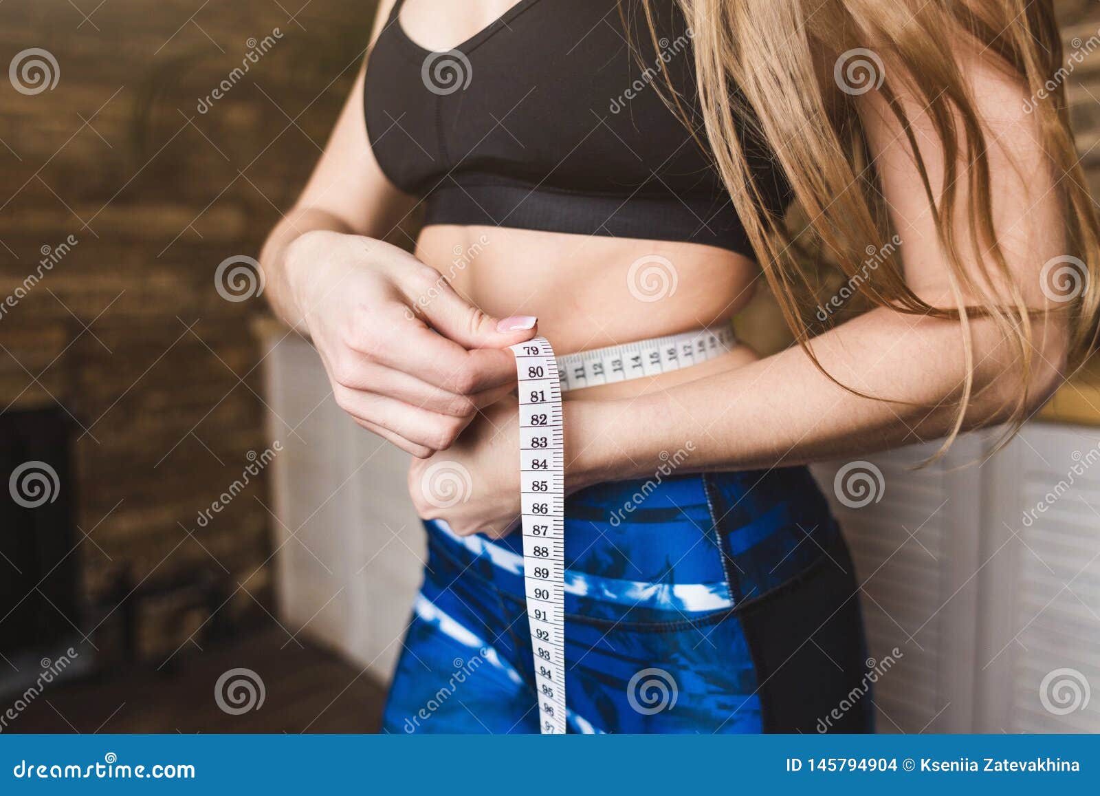 Sexy Woman Measures Waist Stock Photos - Free & Royalty-Free Stock