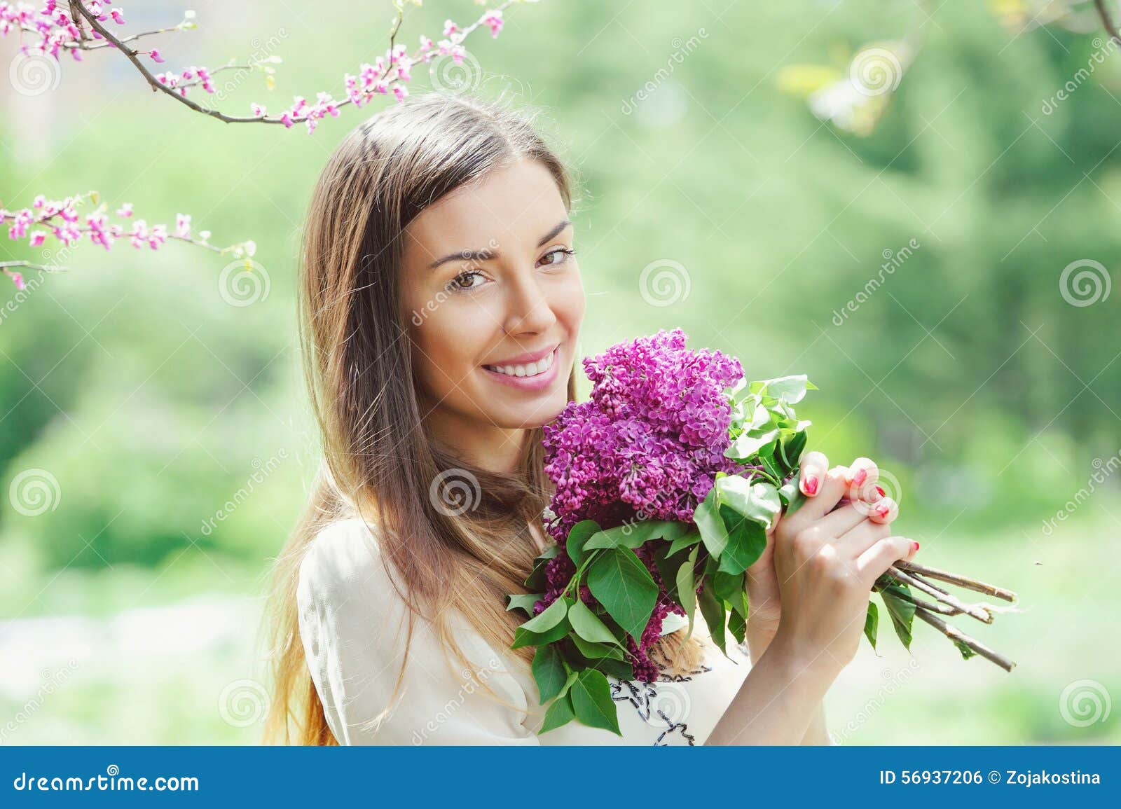 Beautiful Young Woman in Spring Garden Stock Photo - Image of bunch ...