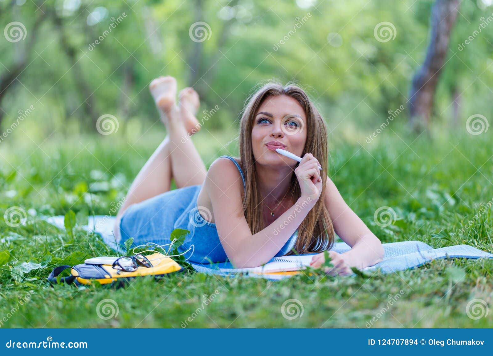 Beautiful Young Girl Writing in Notebook, in the Park Stock Photo ...