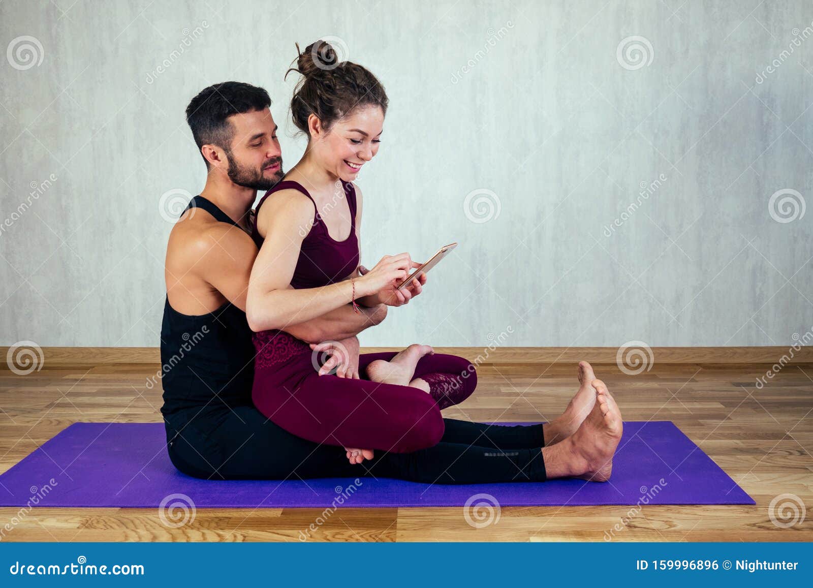 beautiful young women curly hair sexy men doing selfie yoga mat floor concept pair tantric woman man 159996896