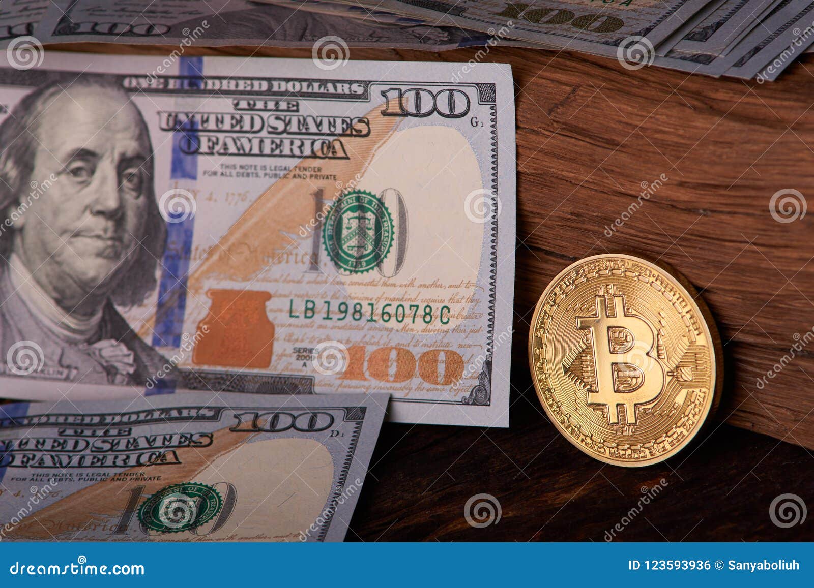 Beautifully Arranged Bills 100 Dollar And Gold Coin Bitcoin On A - 