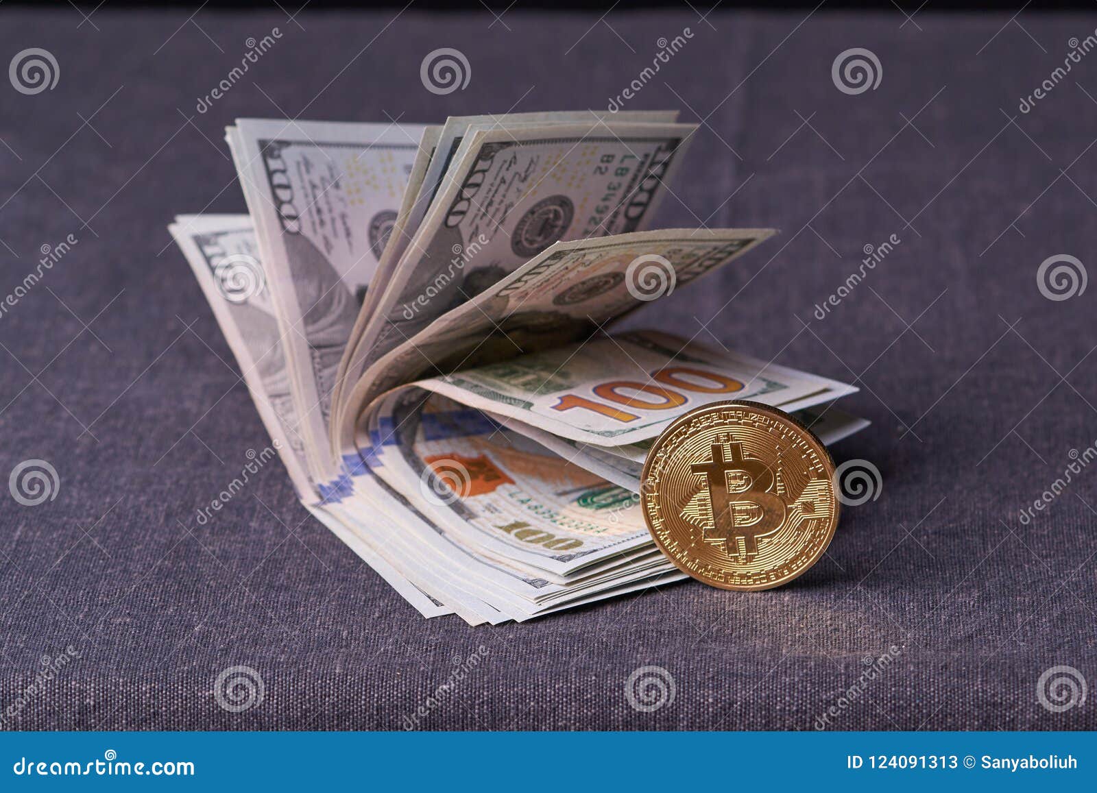 Beautifully Arranged Bills 100 Dollar And Gold Coin Bitcoin On A - 