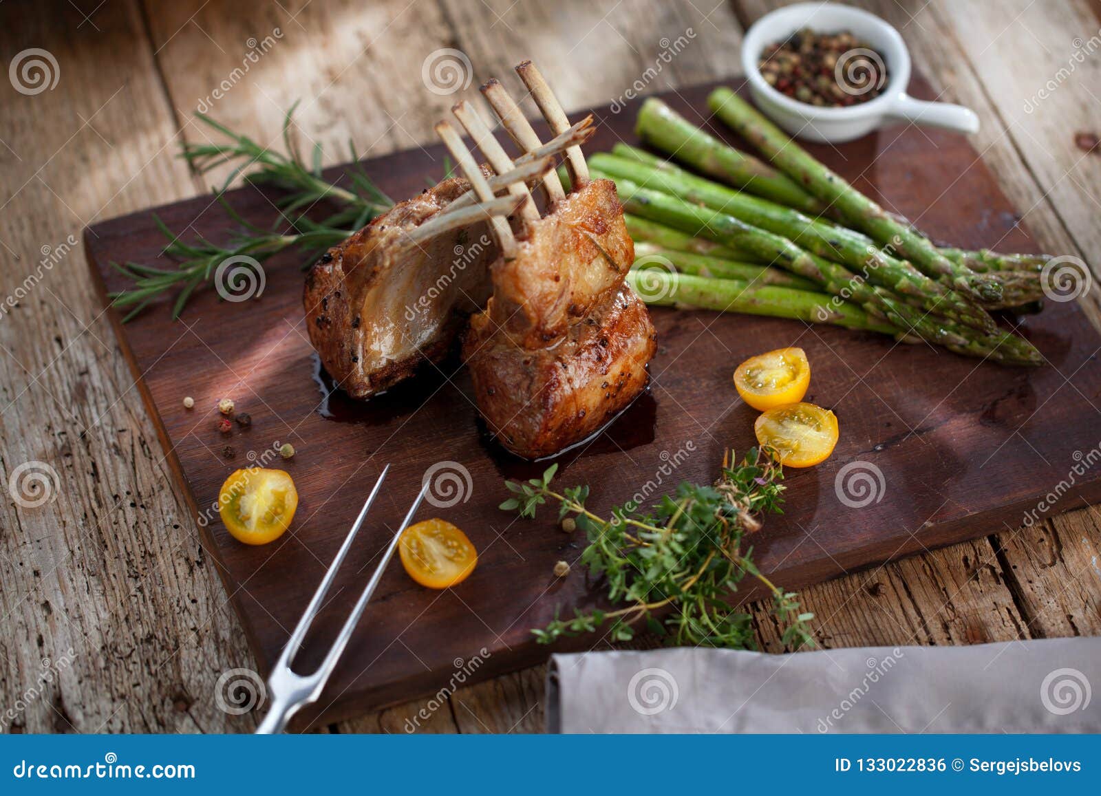 Beautifully Grilled Lamb Rib Chop Steaks, Medium Rare . Stock Photo