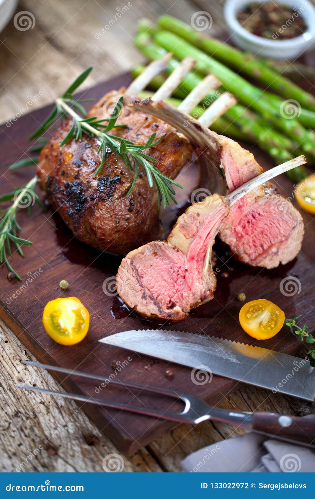 Beautifully Grilled Lamb Rib Chop Steaks, Medium Rare . Stock Photo