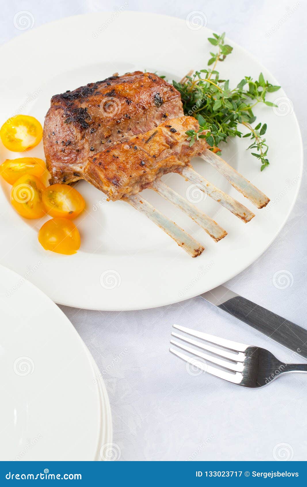 Beautifully Grilled Lamb Rib Chop Steaks, Medium Rare . Stock Image