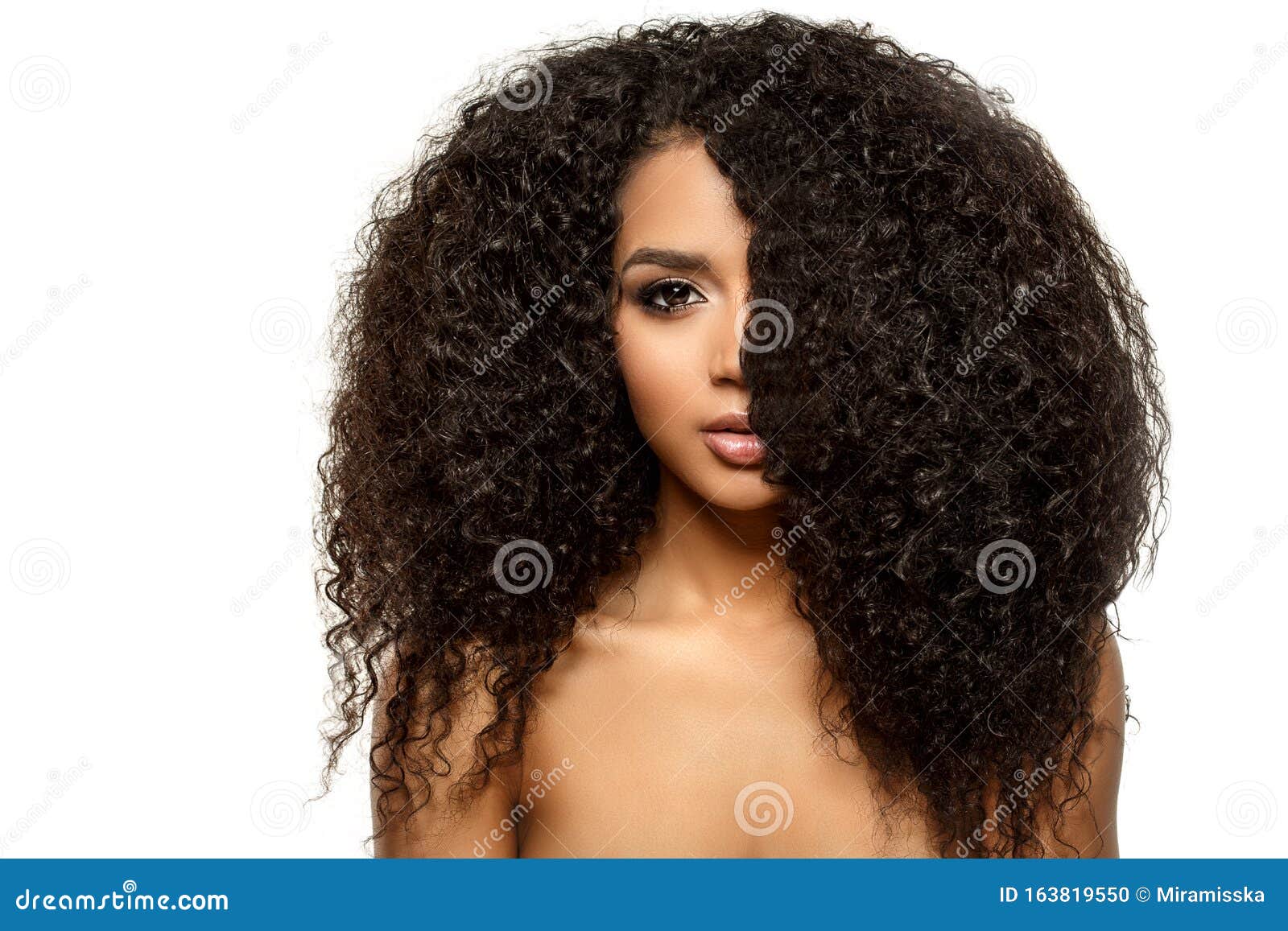 beauty black skin woman african ethnic female face. young african american model with long afro hair. lux model