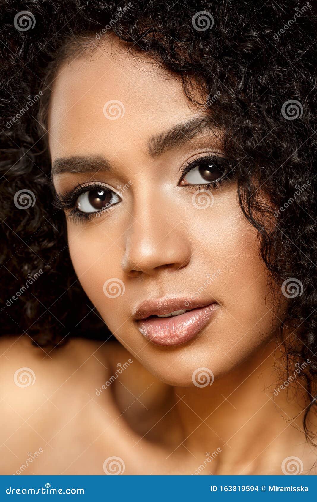 beauty black skin woman african ethnic female face. young african american model with long afro hair. lux model