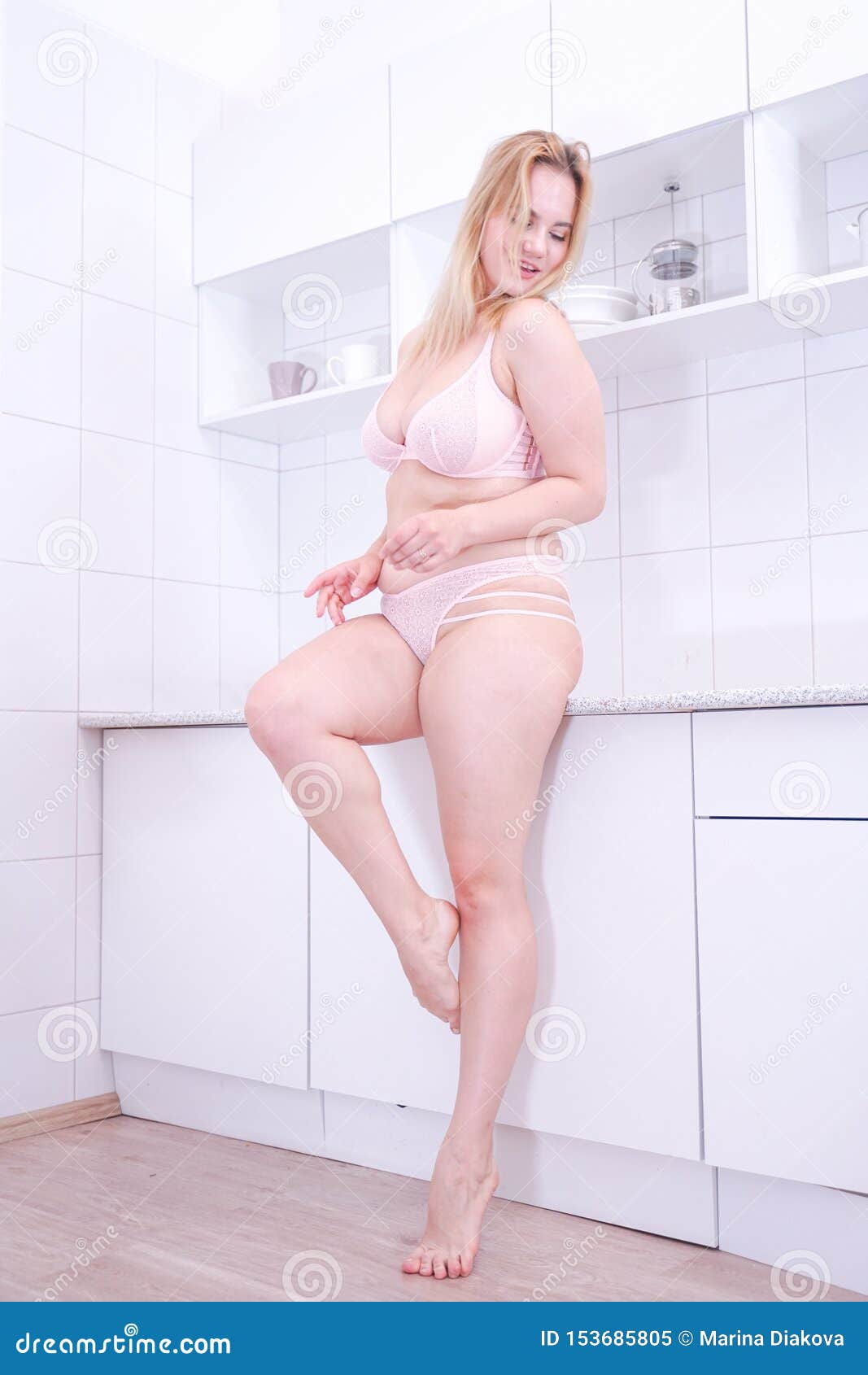 Beauty Blonde Caucasian Girl with Chubby Body in Pink Lingerie on White  Kitchen at Home Stock Image - Image of overweight, body: 153685805