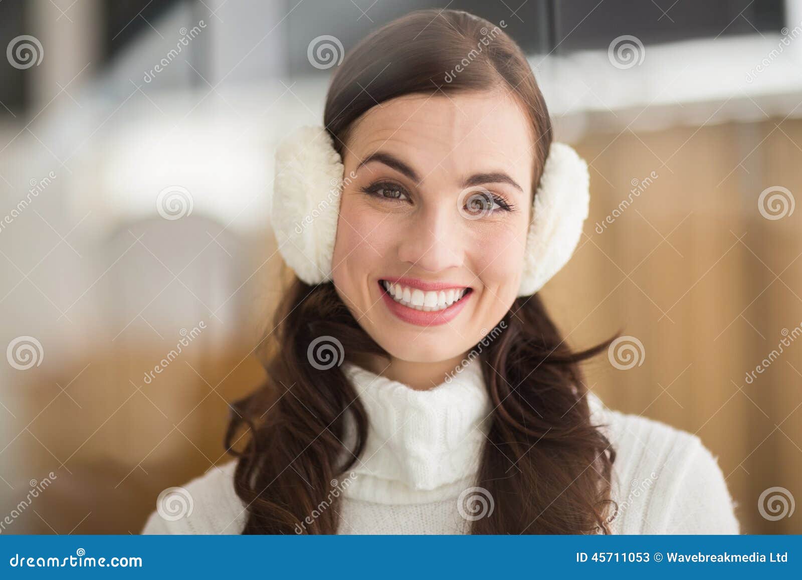 Beauty with Ear Muffs Smiling at Camera Stock Image Image of