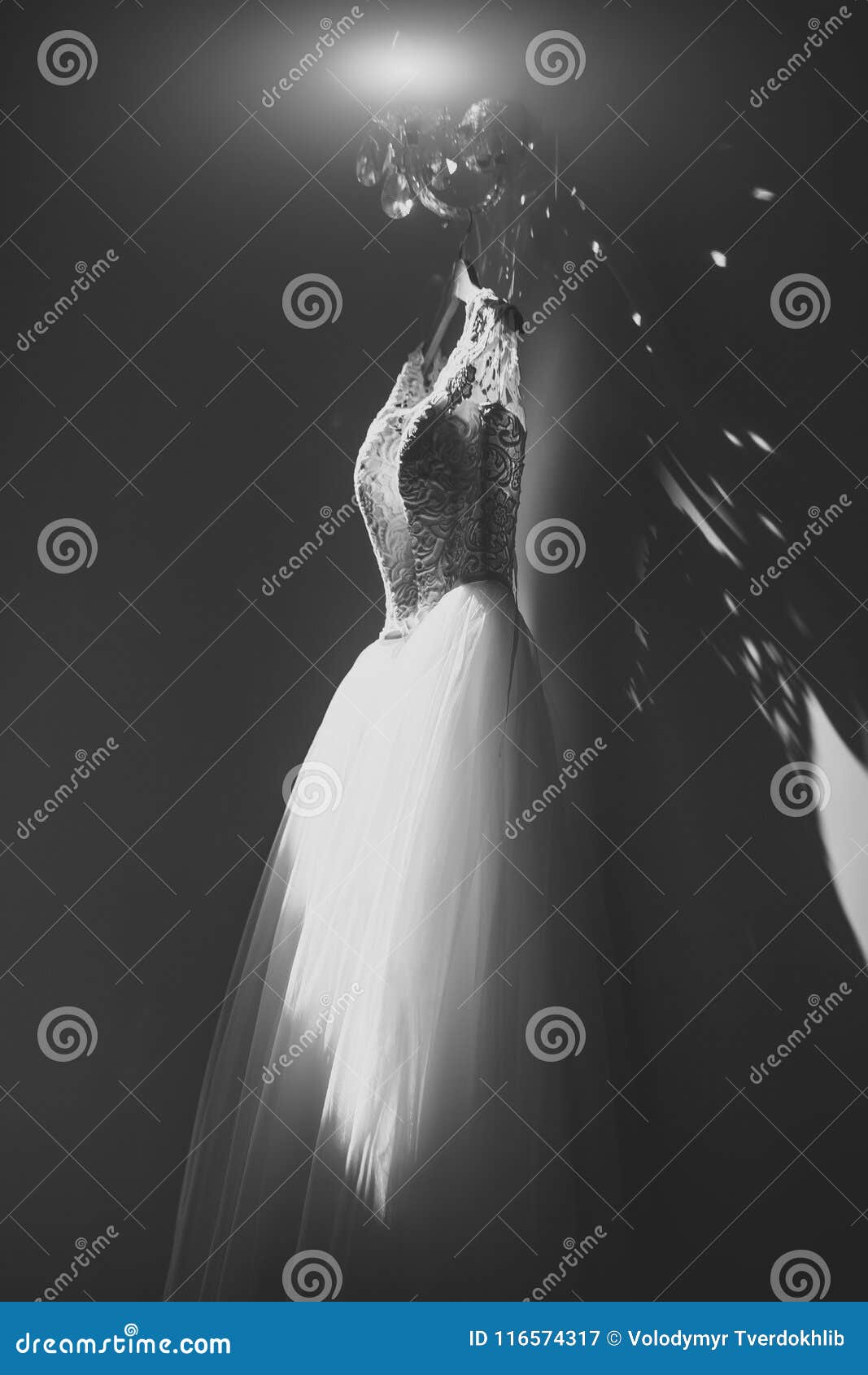 Beauty and Fashion, Wedding Dress Hanging at Beautiful Lamp Stock Image ...