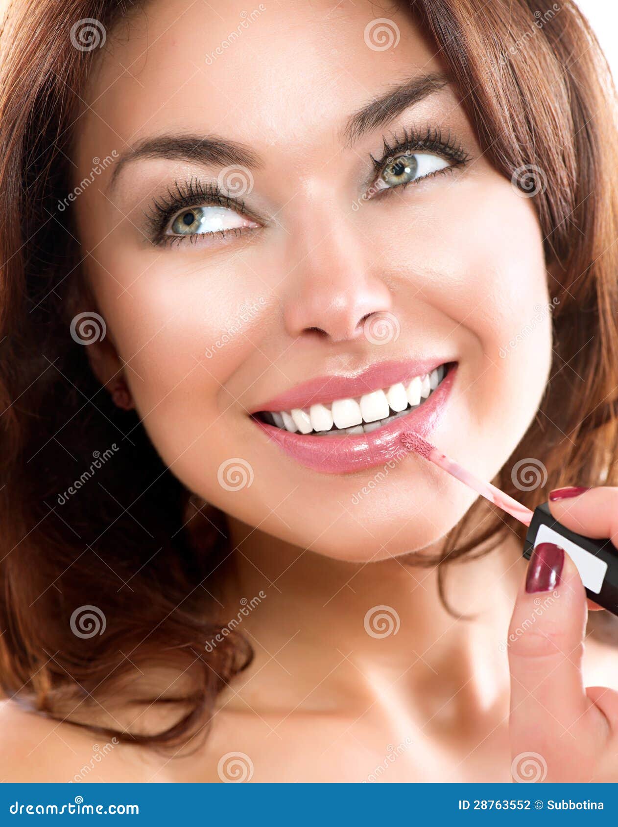 beauty girl applying lipgloss